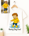 Wall decal of a child in a yellow raincoat and boots with 'Rainy Day Fun!' text, on a white wall.